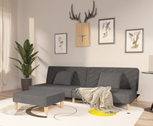 Szara rozkładana sofa z podnóżkiem