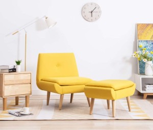 Żółty fotel z podnóżkiem do salonu