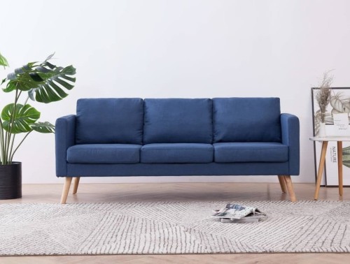 Duża-niebieska-sofa-do-salonu-z-poduszkami