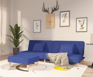 Niebieska rozkładana sofa z podnóżkiem