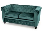 Ciemnozielona pikowana sofa w stylu glamour