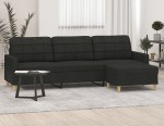 Czarna sofa do salonu z podnóżkiem
