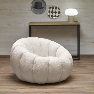 Kremowy fotel bubble z tkaniny boucle