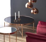 Okrągła szklana ława miedziana z czarnym blatem