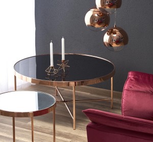 Okrągła szklana ława miedziana z czarnym blatem