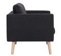 Bok-czarnej-sofy-na-drewnianych-nóżkach